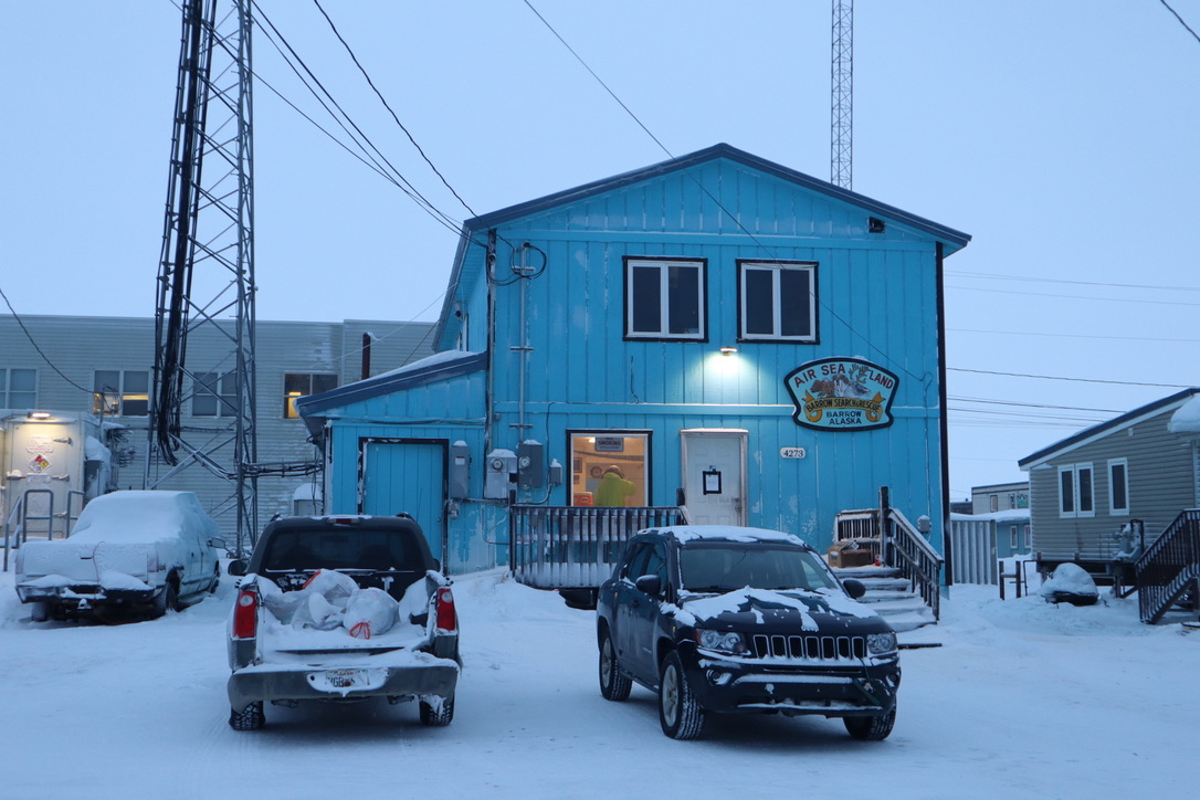 a blue two-story building