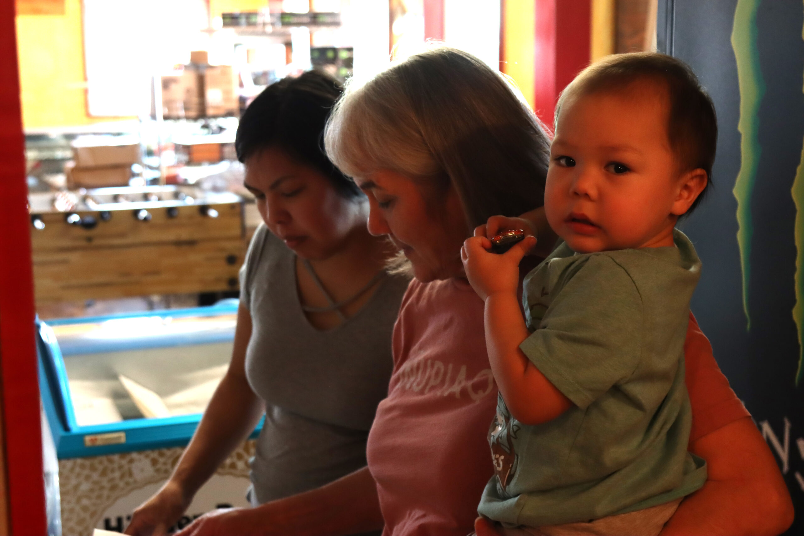 a woman holds a baby
